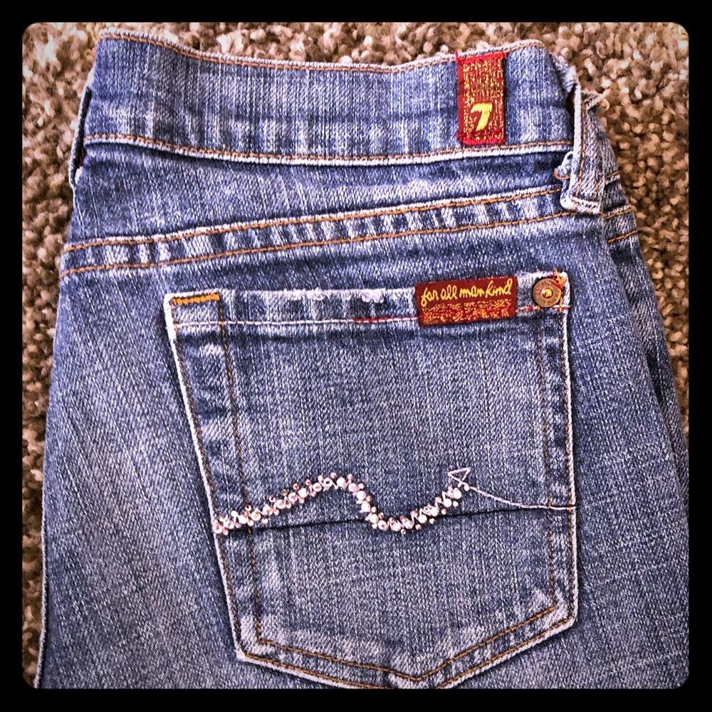 Mid Rise Boot cut jeans by 7 For All Mankind.